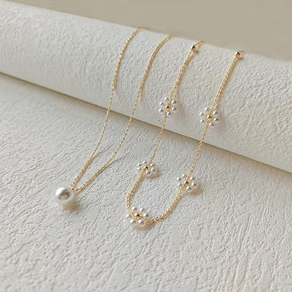 Mehrlagige Perlenkette mit Blumen-Anhänger | Gold