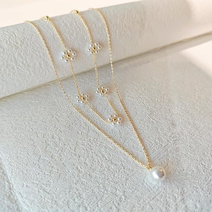 Mehrlagige Perlenkette mit Blumen-Anhänger | Gold
