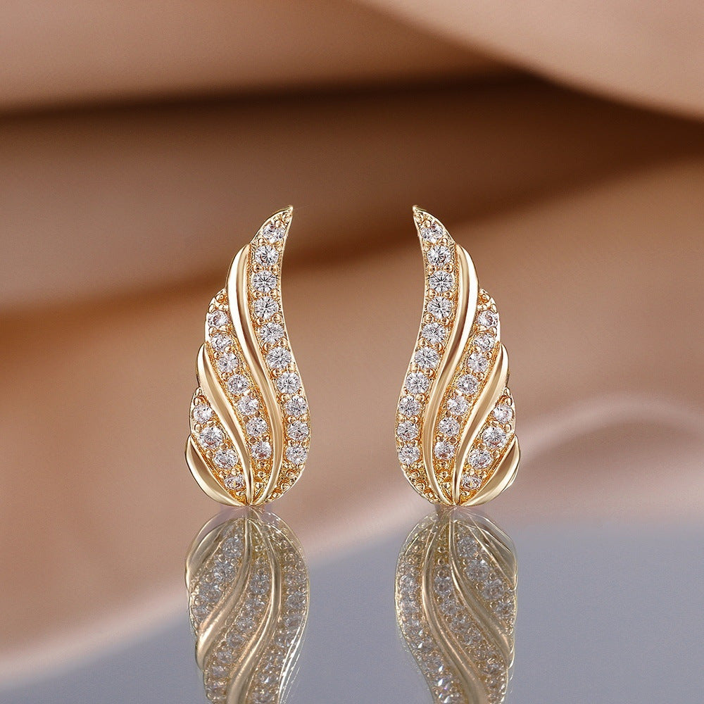 Moderne Ohrringe mit Blätter-Pavé | Gold