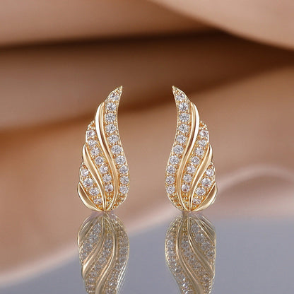 Moderne Ohrringe mit Blätter-Pavé | Gold